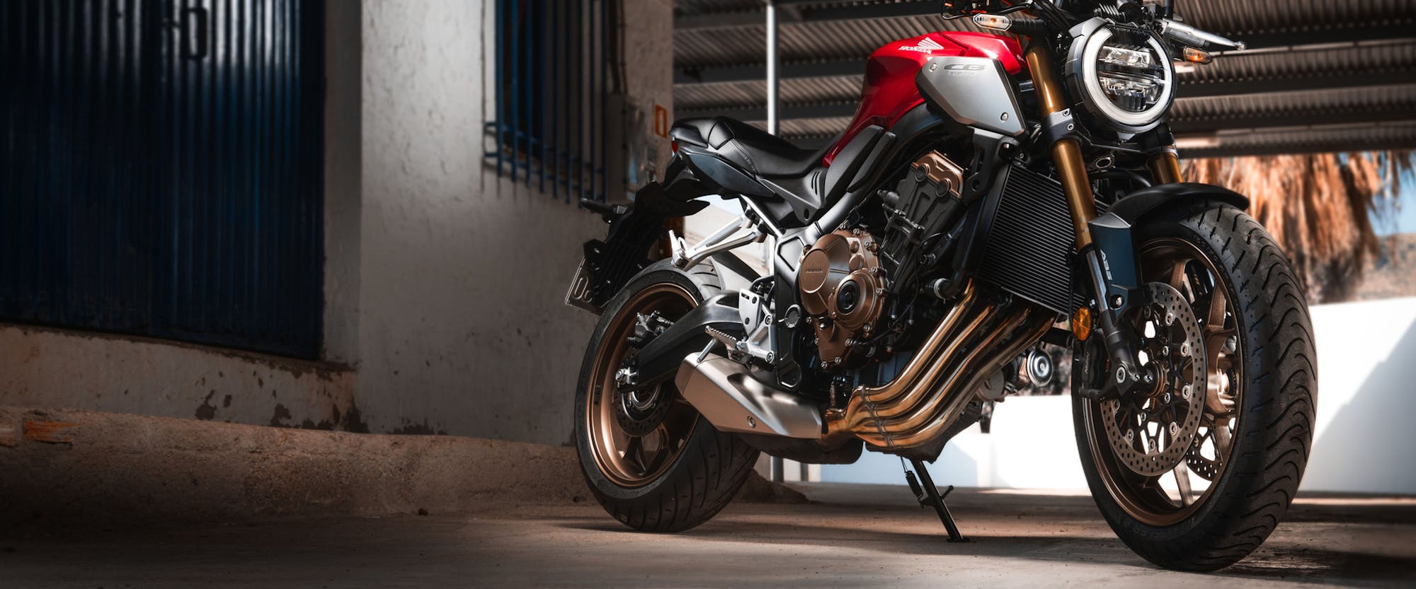 Honda CB650R in Candy Chromosphere Red colour, parked
