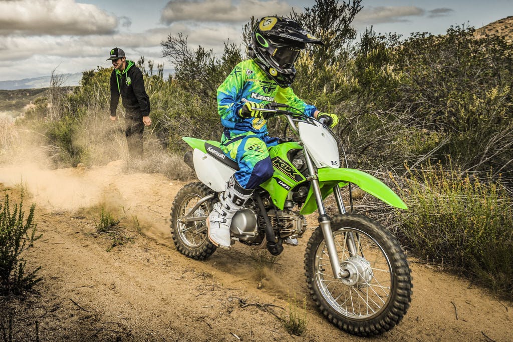 Kawasaki KLX110R in Lime Green colour on track