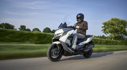 BMW C 400 GT ION being ridden on the road