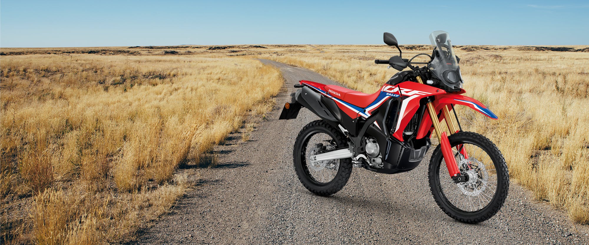 CRF300 Rally in extreme red colour, parked