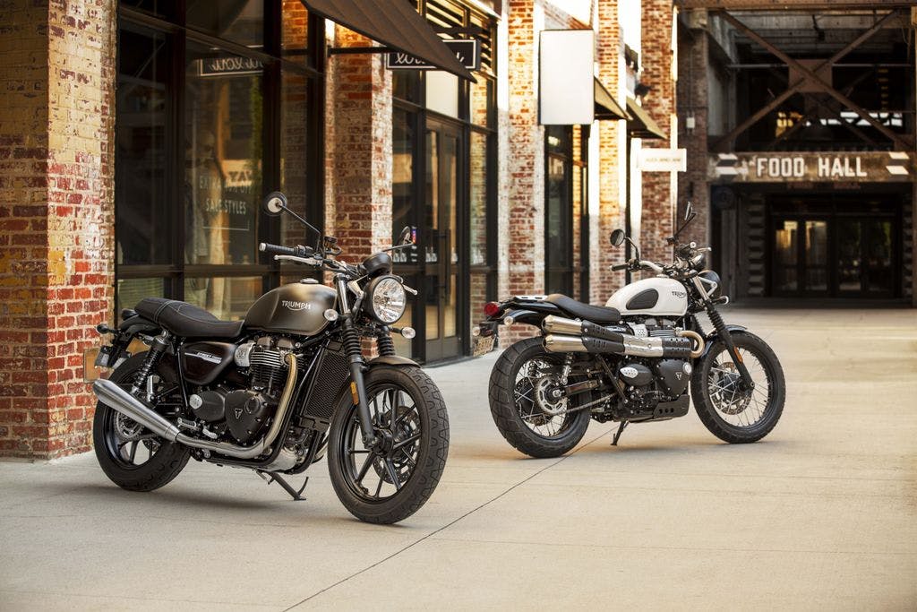 TRIUMPH STREET SCRAMBLER in matt khaki and matt aluminium and fusion white colour, parked