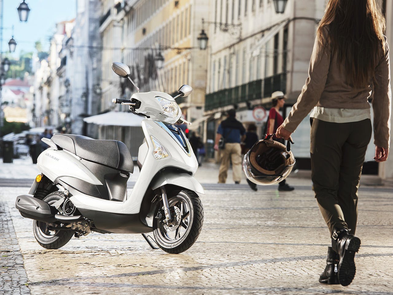 Yamaha D'elight 125 scooter in Milky White parked on street