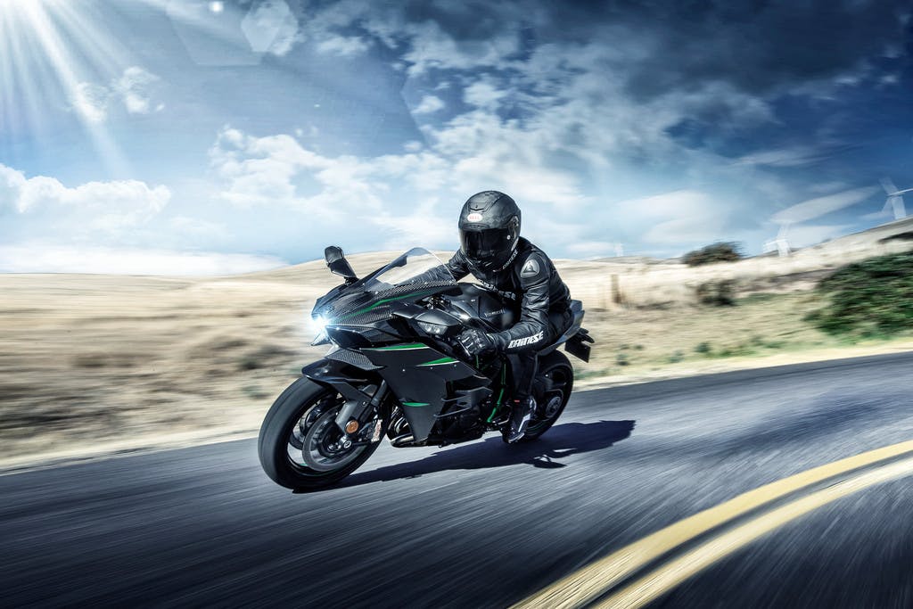 KAWASAKI NINJA H2 CARBON being ridden on a road