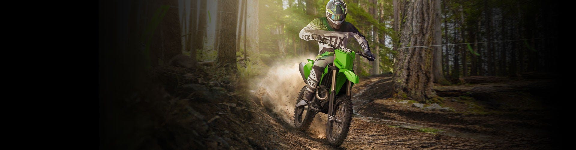 Kawasaki KX450XC in lime green colour on off road track