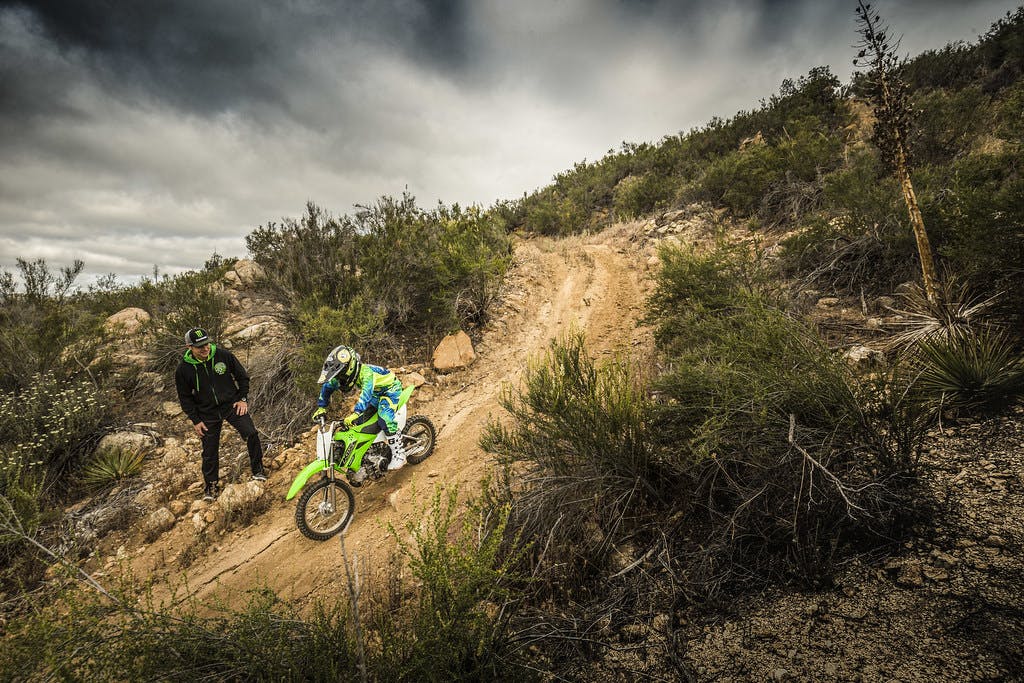 Kawasaki KLX110R in Lime Green colour on track