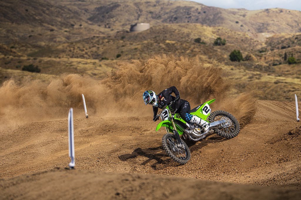 Kawasaki KX450 in Lime Green colour on dirt track
