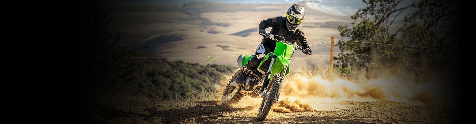 Kawasaki KX250X in lime green colour on off road track