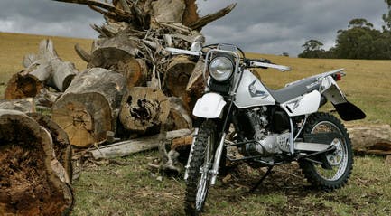 SUZUKI TROJAN parked