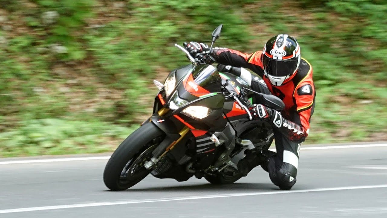 Aprilia Tuono V4 1100 Factory in Atomico Racer colour on the road