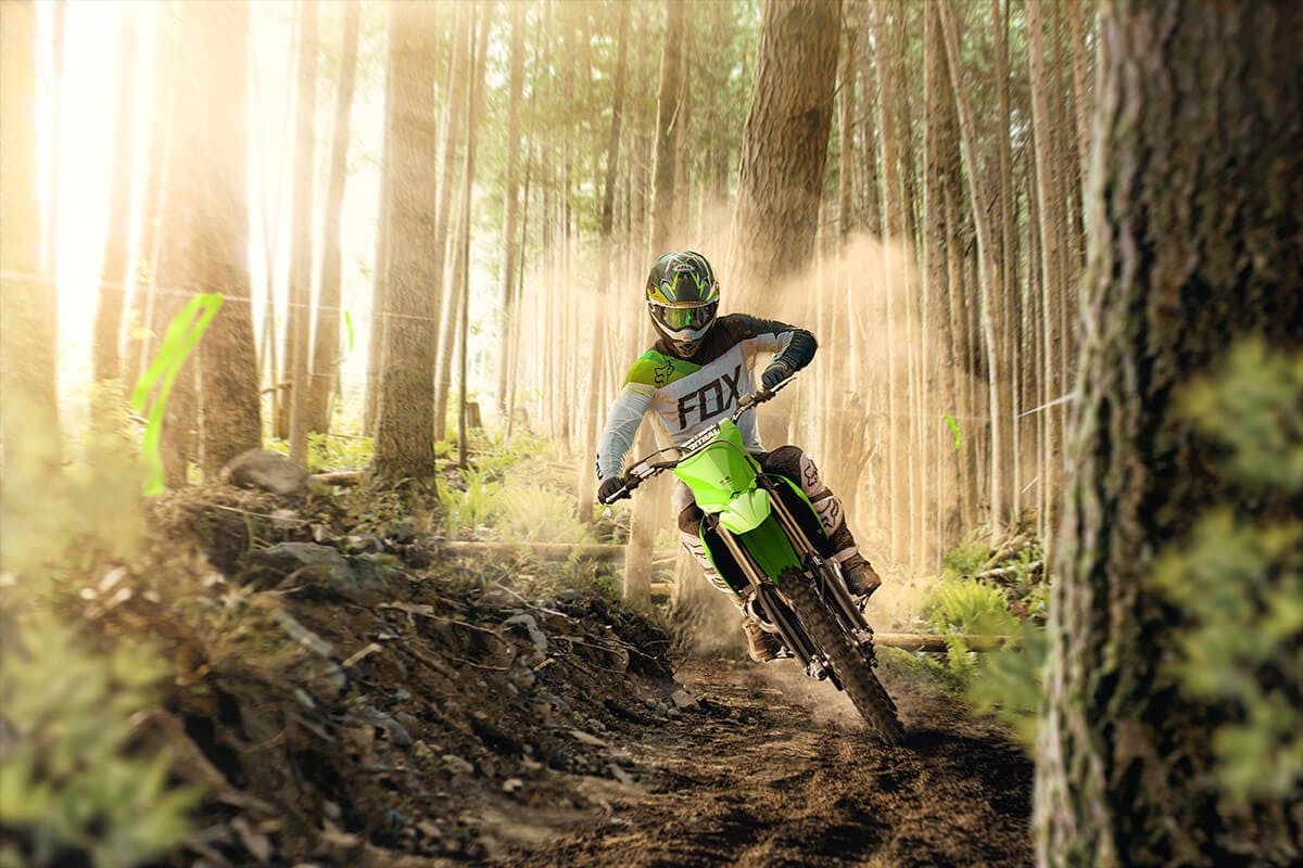 Kawasaki KX450XC in lime green colour on off road track