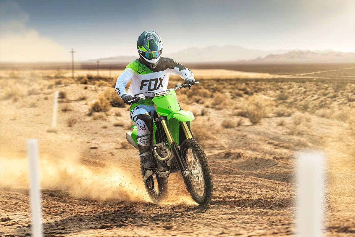 Kawasaki KX450XC in lime green colour on off road track