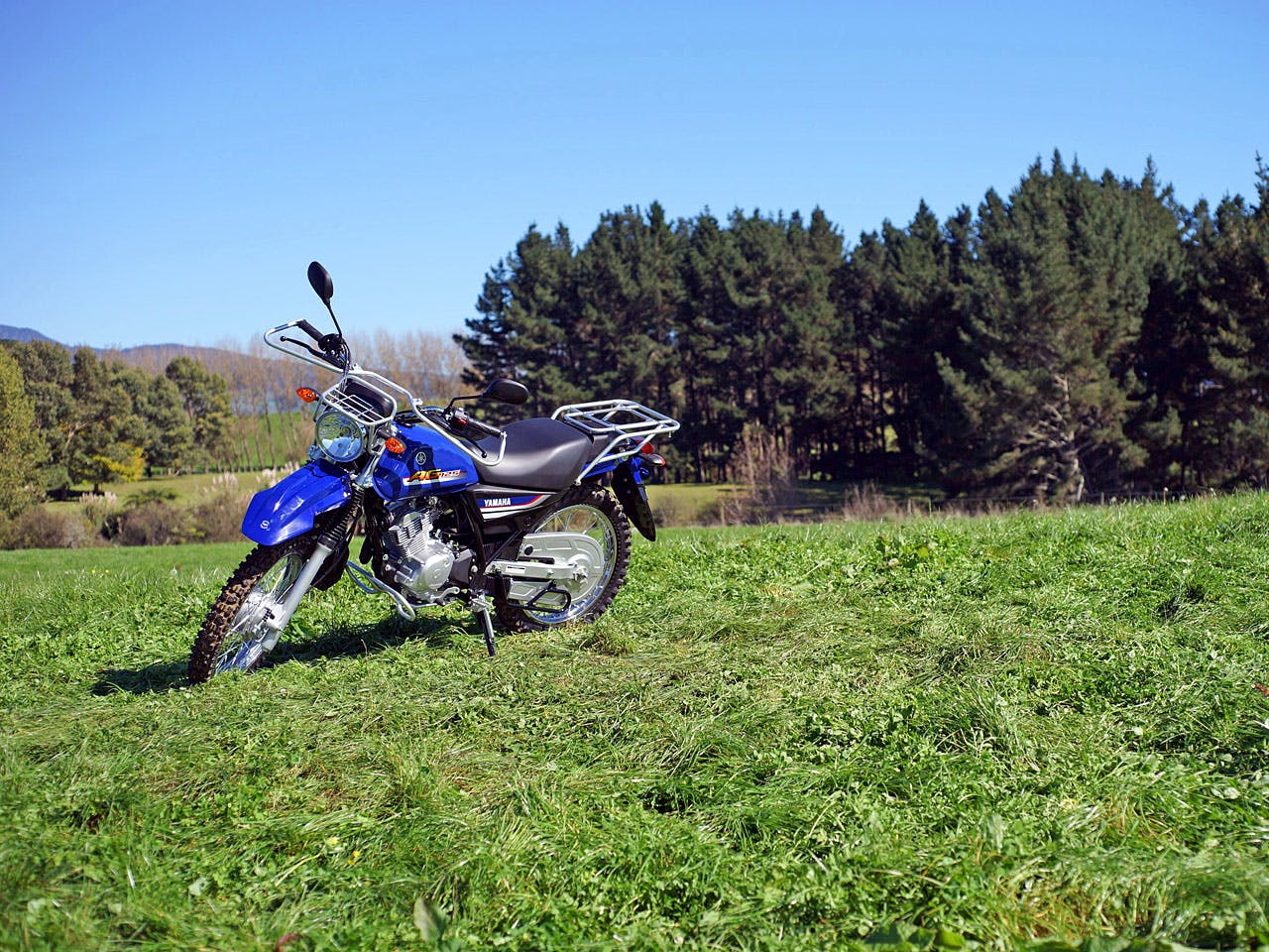 Yamaha AG125 motorcycle on a farm