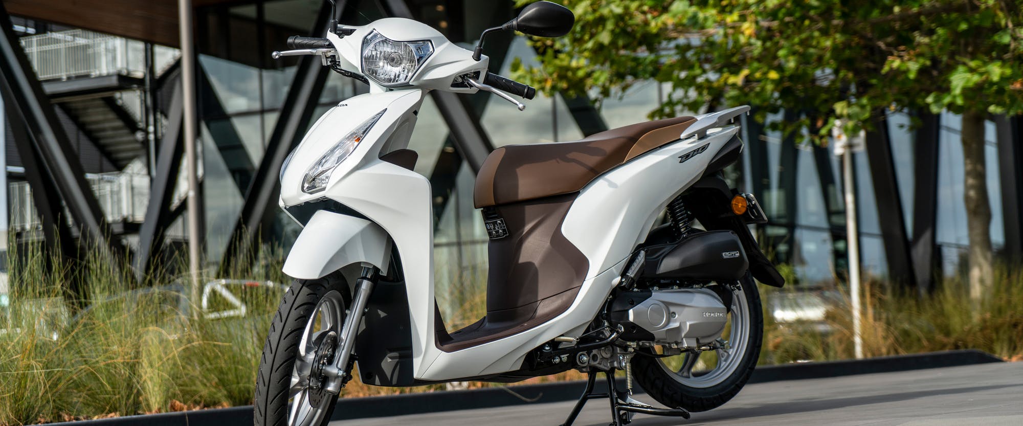 Honda NSC110 Dio in Pearl Iceberg White,parked
