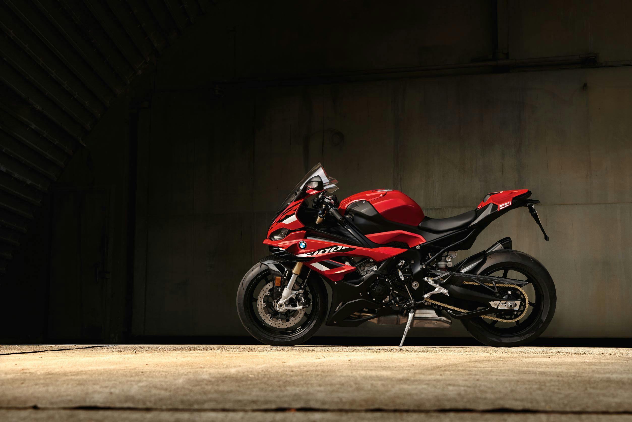 BMW S 1000 RR Sport in racing red colour, parked.