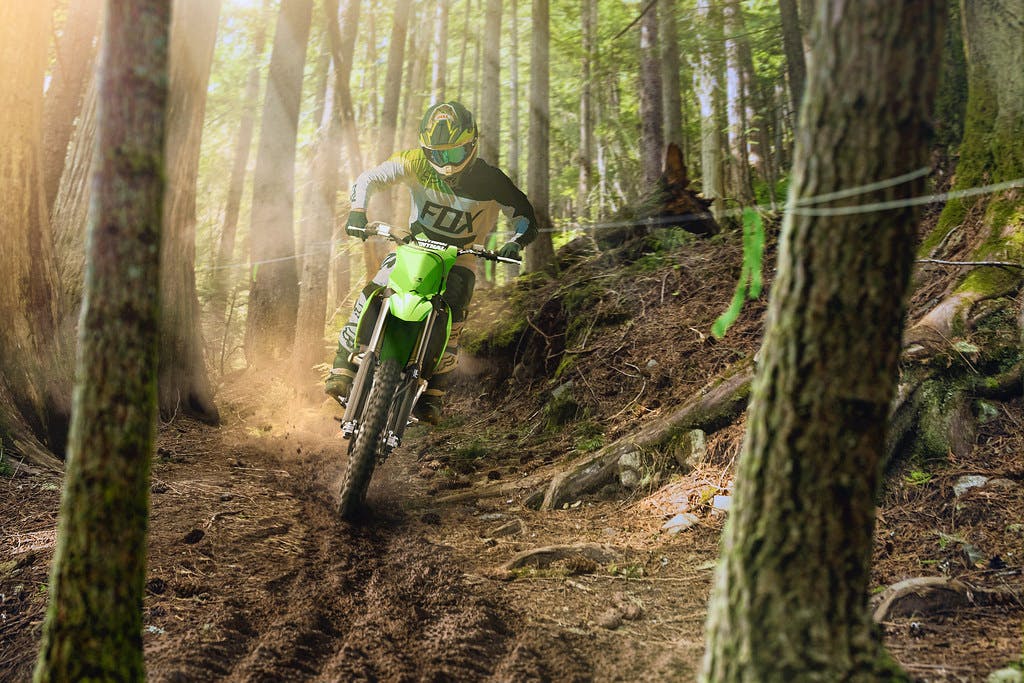 Kawasaki KX250X in Lime Green colour on off-road track