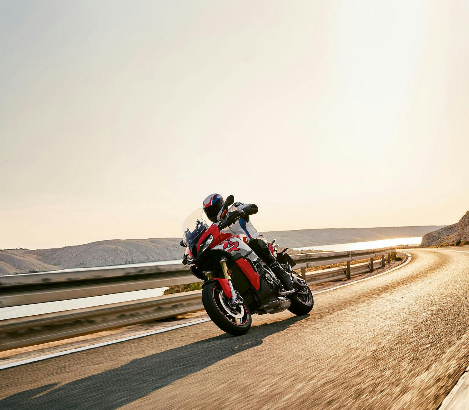 BMW S 1000 XR being ridden on the hill road