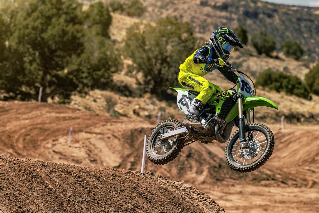 KAWASAKI KX85 in action on off-road track