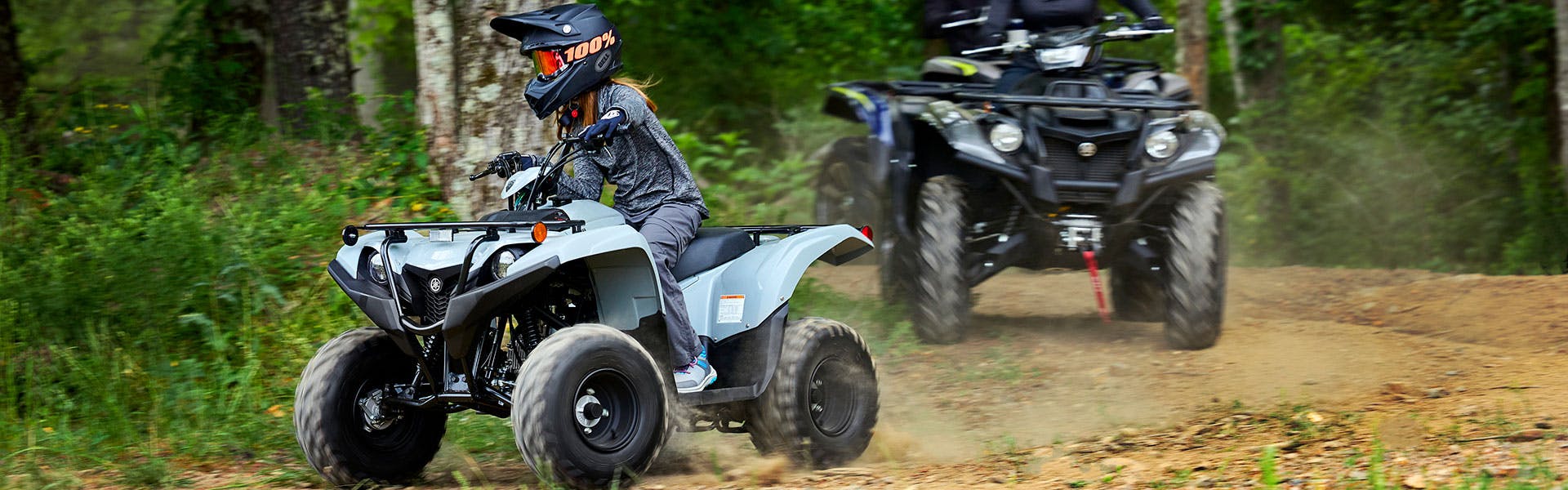 Yamaha Grizzly 90 in armour grey colour in action on off road track