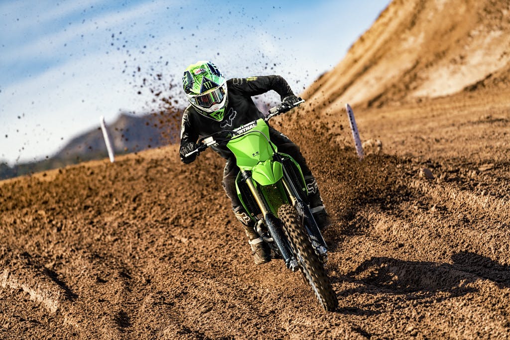 Kawasaki KX450 in Lime Green colour on dirt track