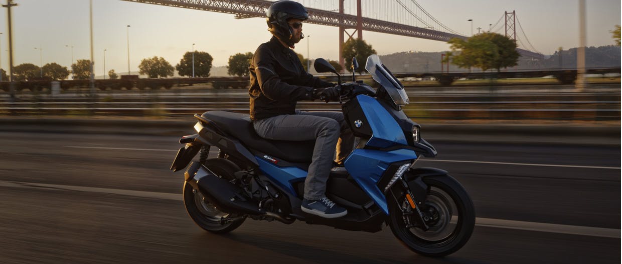 BMW C 400 X ion being ridden on a road