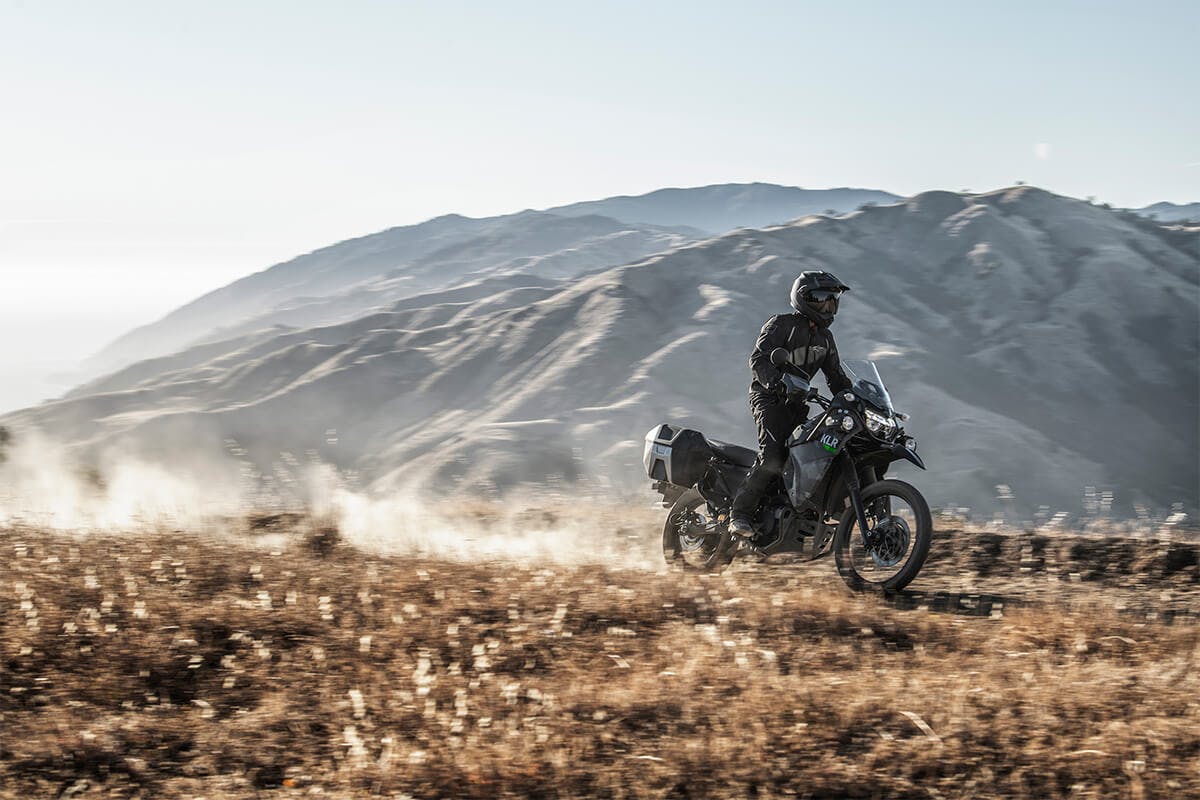 Kawasaki KLR650 Adventure in cypher camo gray colour in action on off-road track