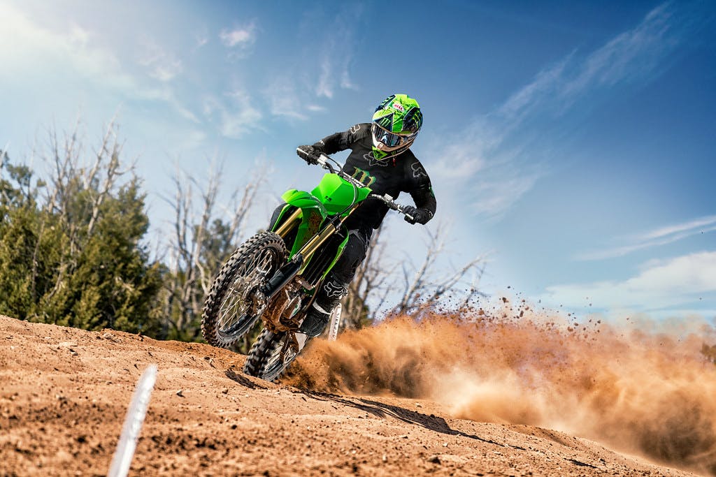 Kawasaki KX450 in Lime Green colour on dirt track