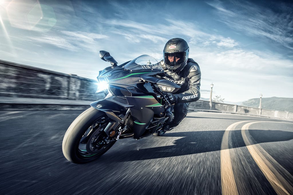 KAWASAKI NINJA H2 CARBON being ridden on a road