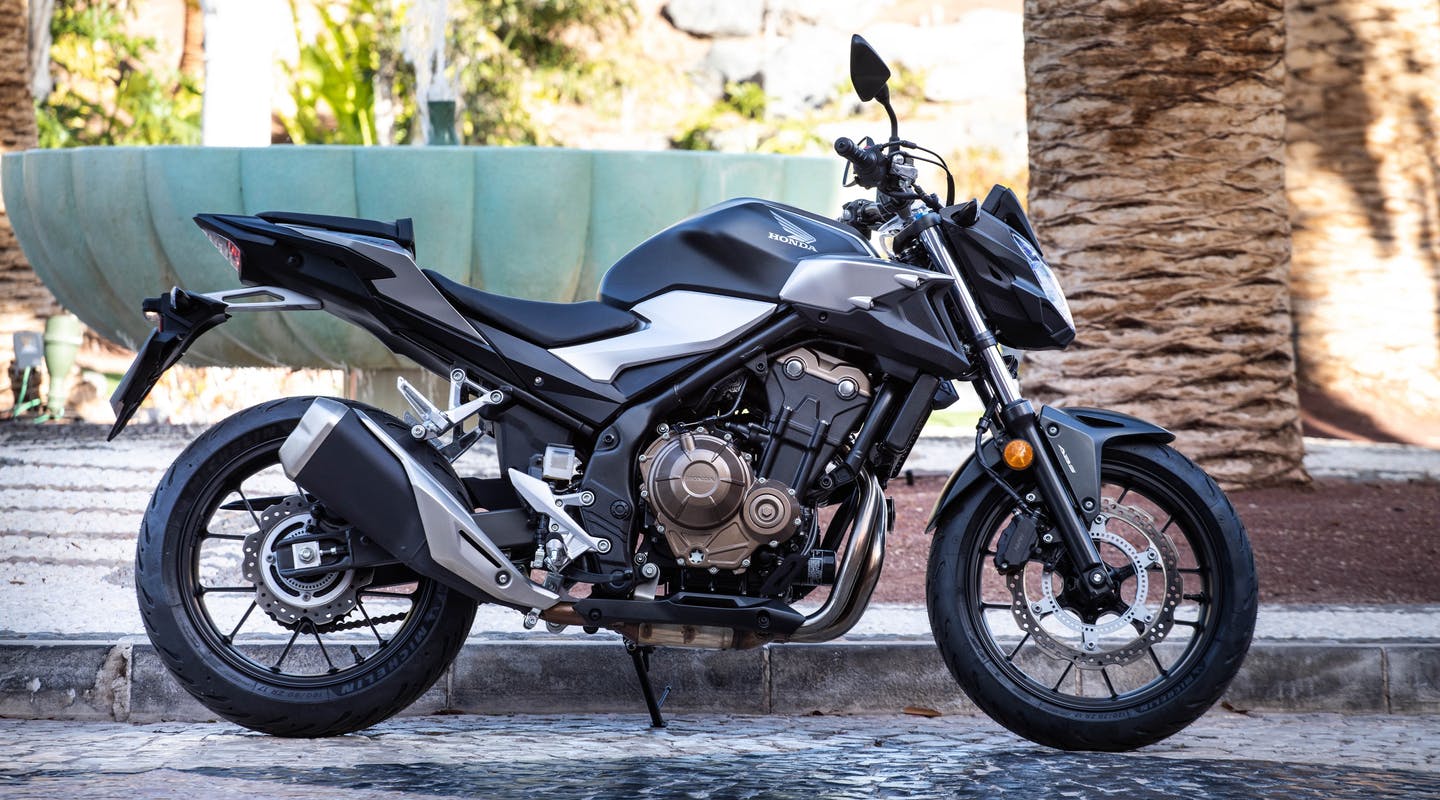 Honda CB500F in matte gunpowder black metallic colour, parked