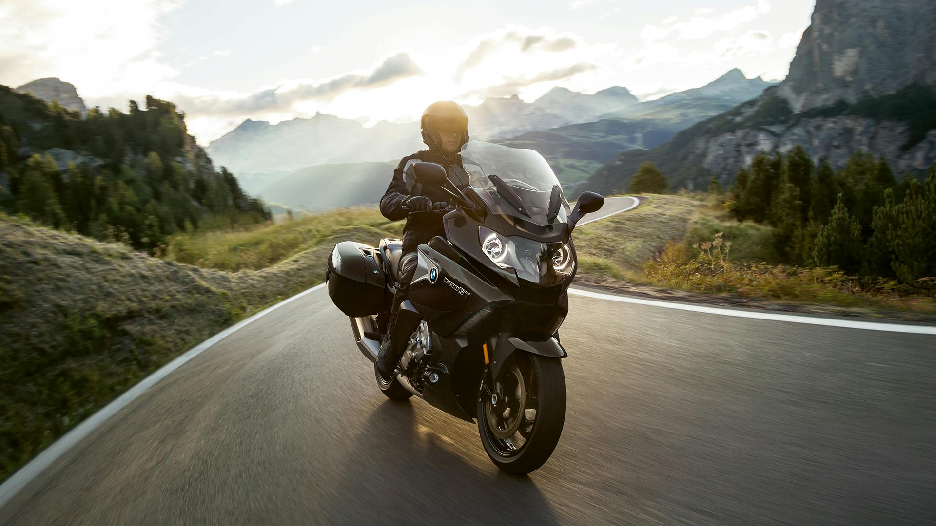 BMW K 1600 GT being ridden on the hill road