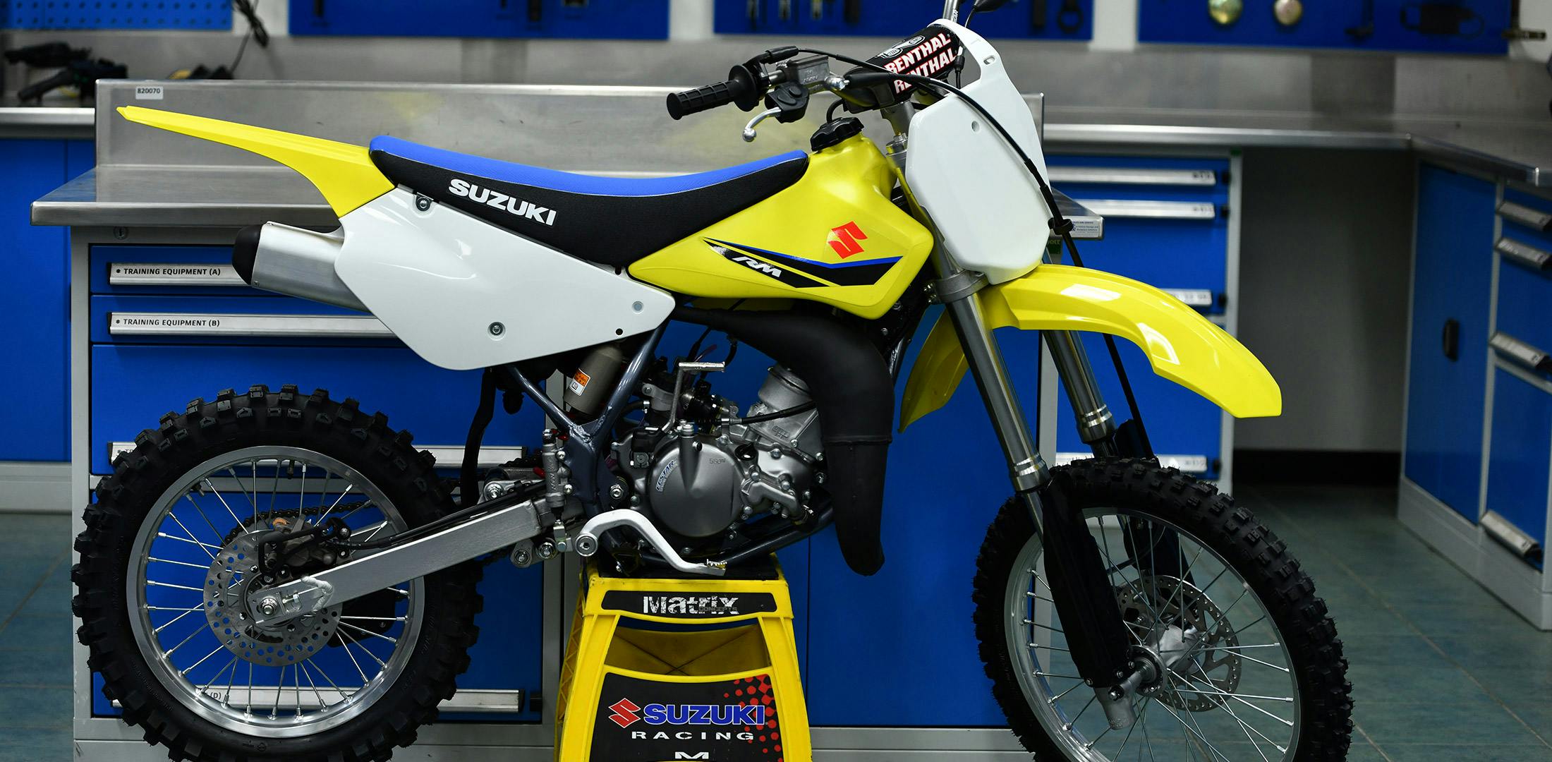 Suzuki RM85L in champion yellow colour