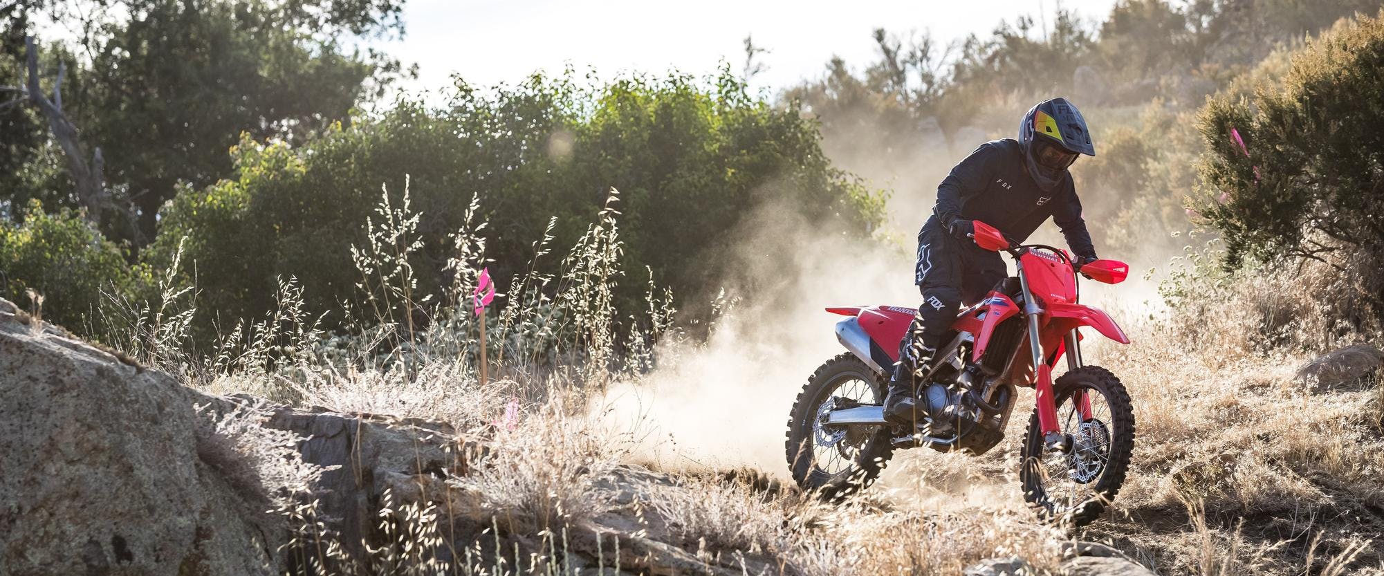 Honda CRF450RX in extreme red colour in action on off road track