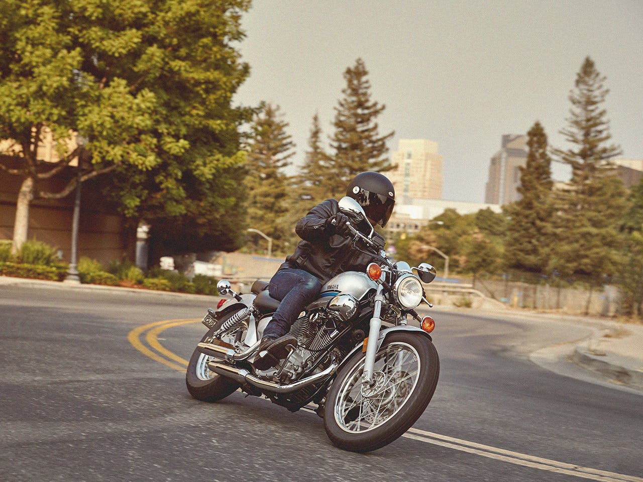 YAMAHA XV250 in Metallic Silver colour on the road
