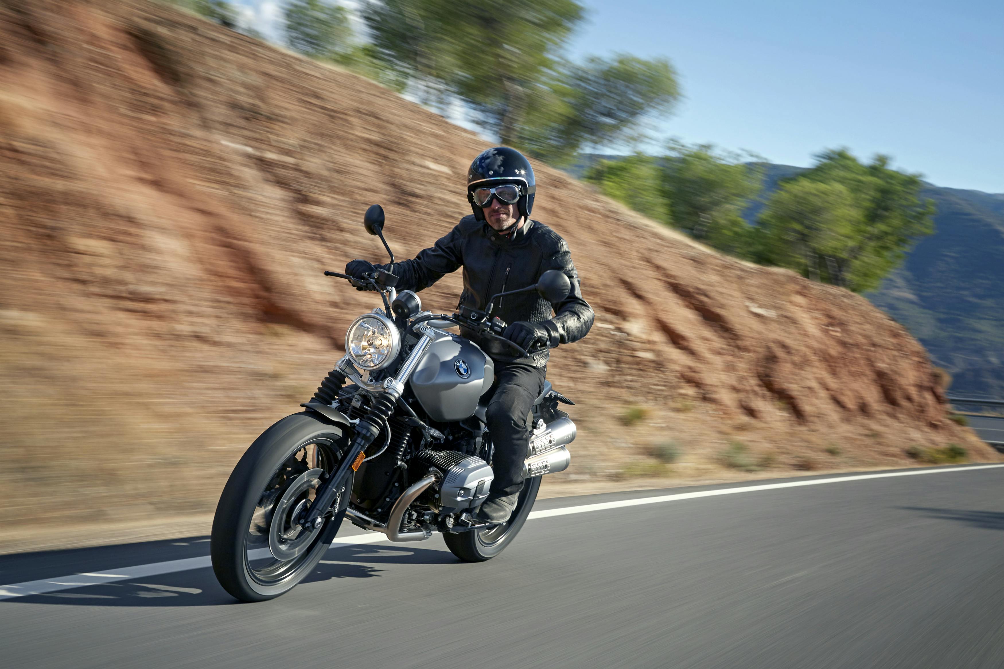 BMW R NINET SCRAMBLER being ridden on the hill road
