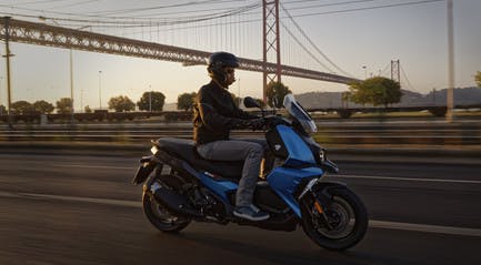 BMW C 400 X ion being ridden on a road