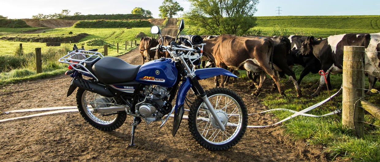 Yamaha AG125 motorcycle on a farm