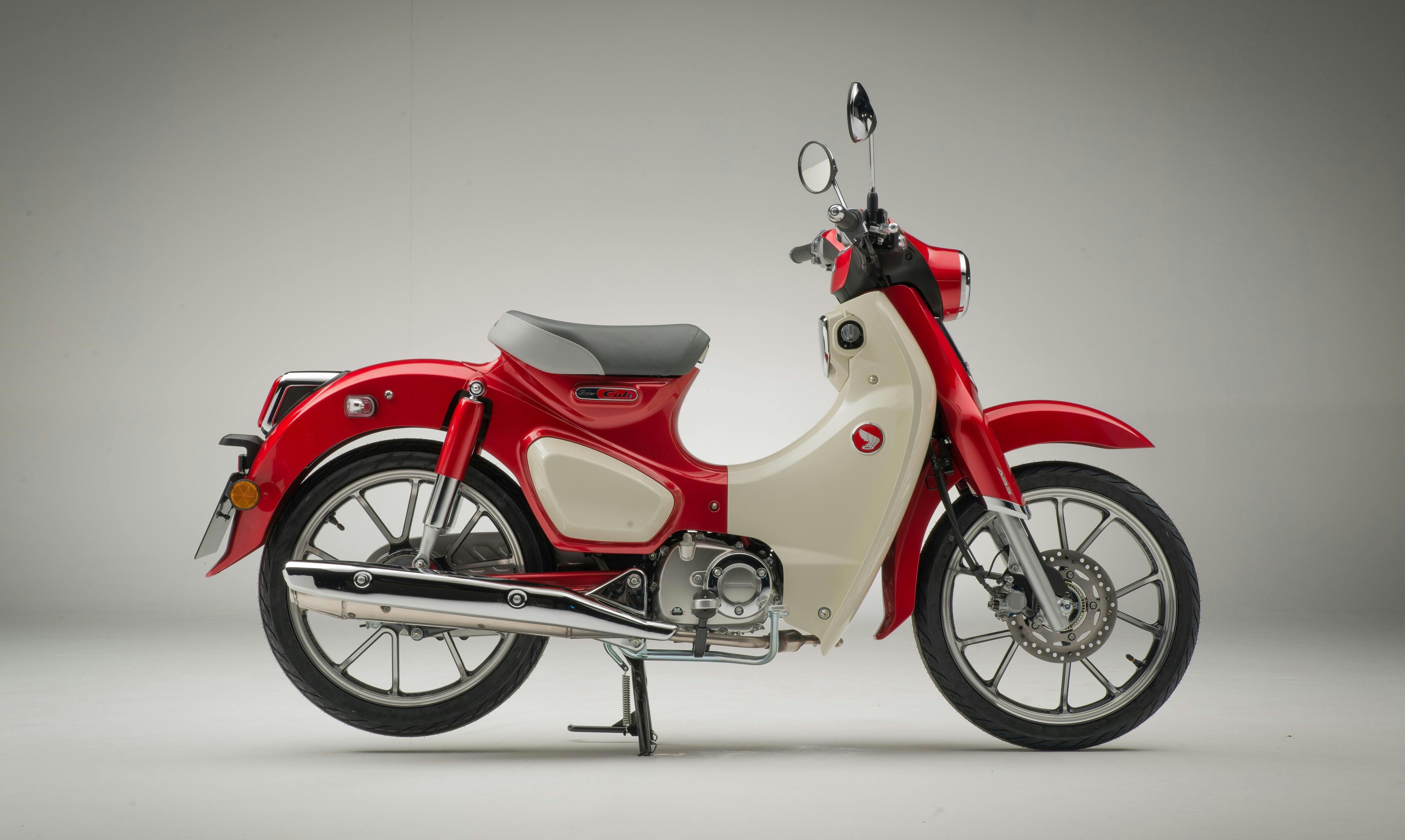 Honda C125 Super Cub in Pearl Nebula Red colour