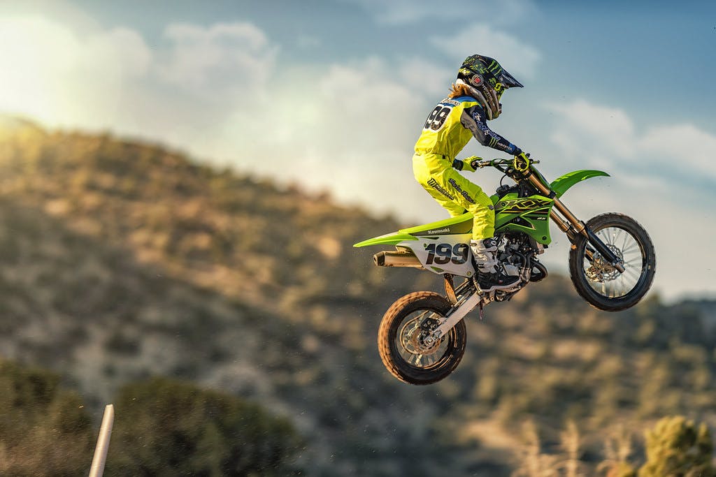 KAWASAKI KX85 in action on off-road track