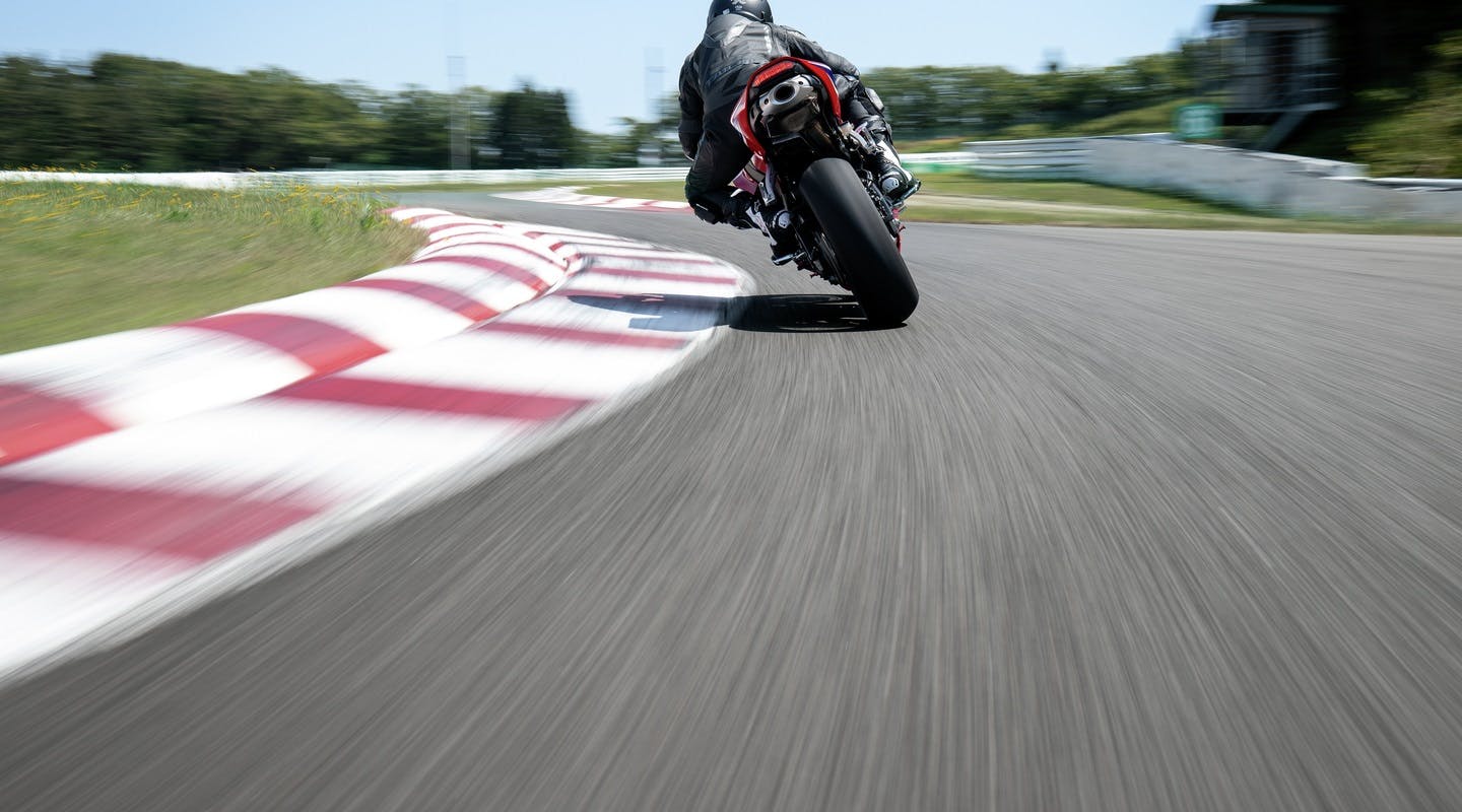 Honda CBR600RR in Grand Prix Red colour on race track