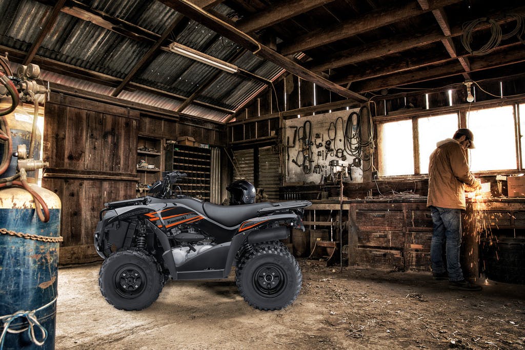 2018 KAWASAKI BRUTE FORCE 300 parked in a garage