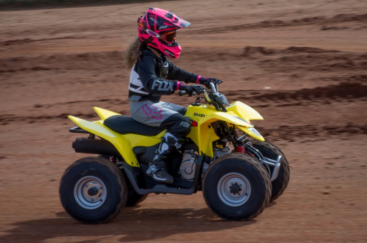 SUZUKI QUADSPORT Z90 being ridden off road