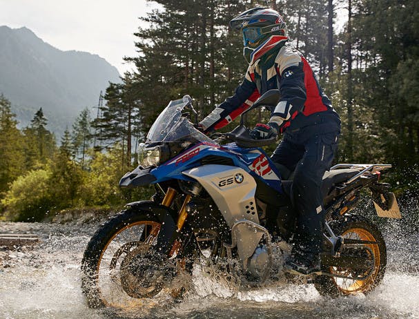 BMW F 850 GS ADVENTURE motorcycle crossing the creek