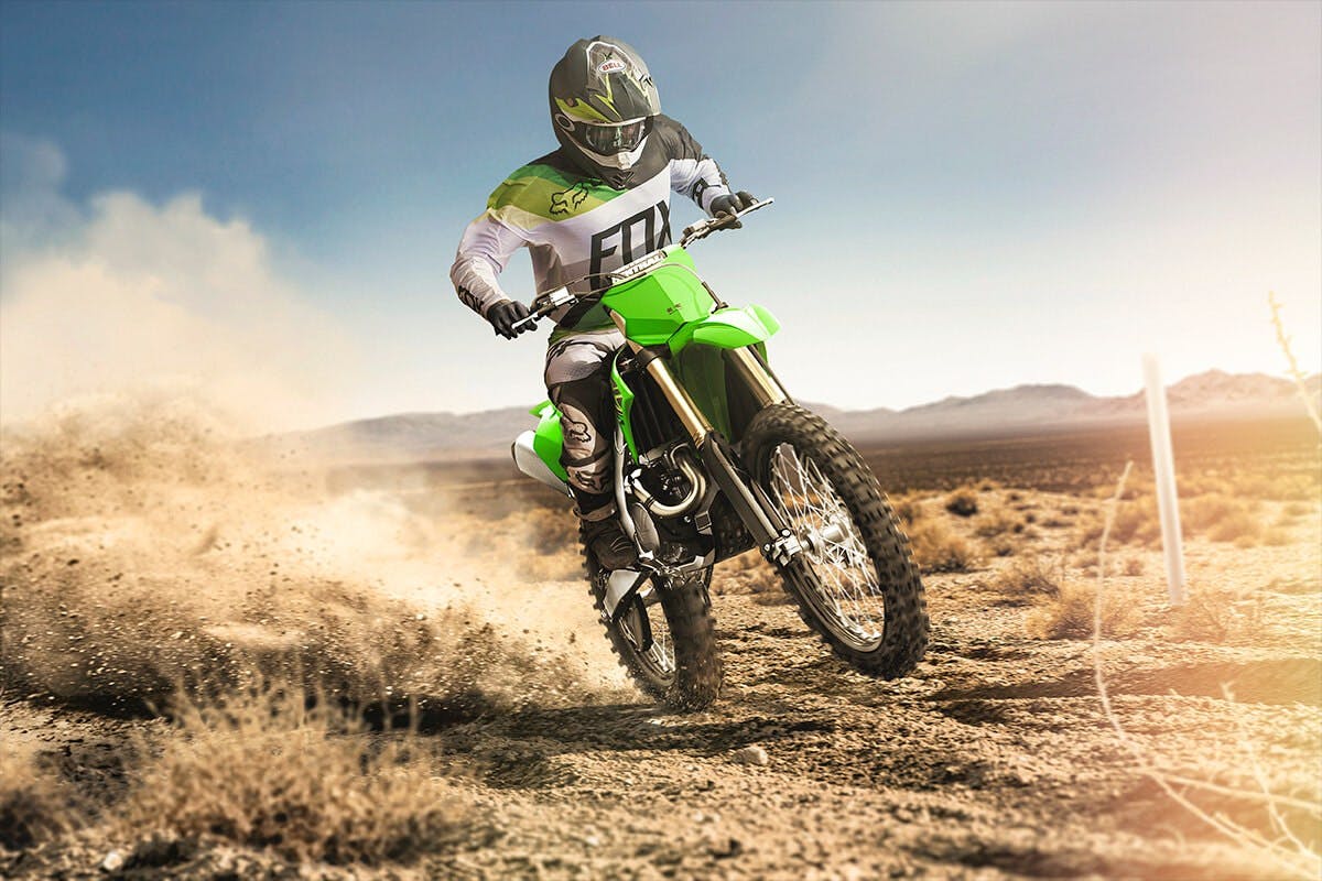 Kawasaki KX450XC in lime green colour on off road track