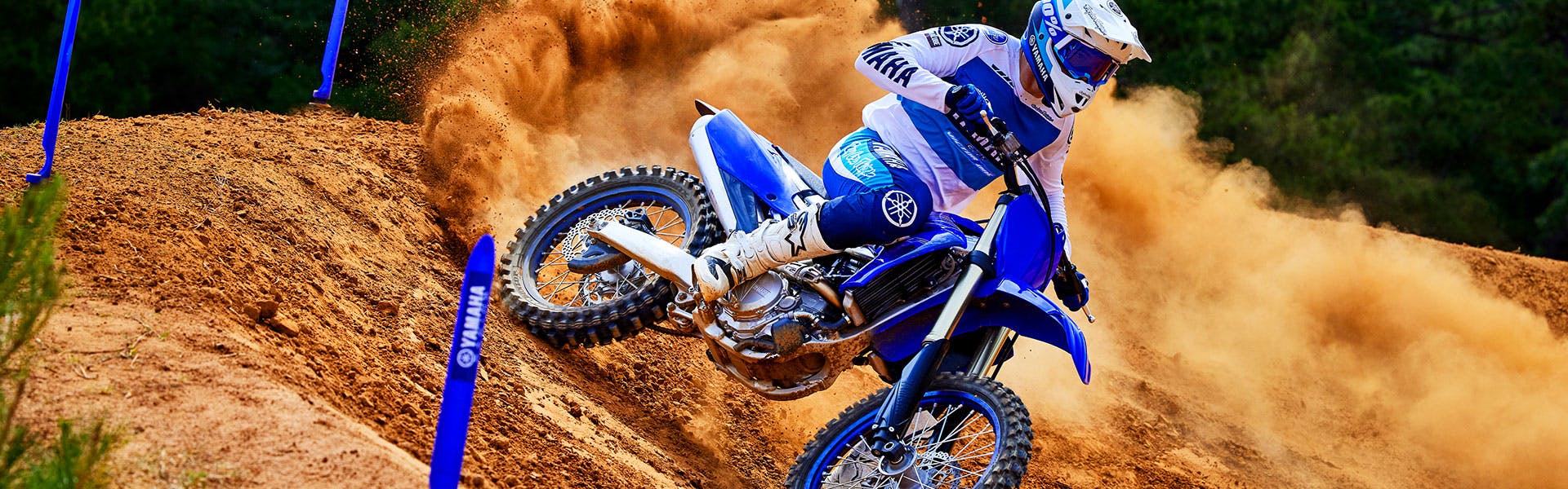 Yamaha YZ450F in team yamaha blue colour, being ridden off-track