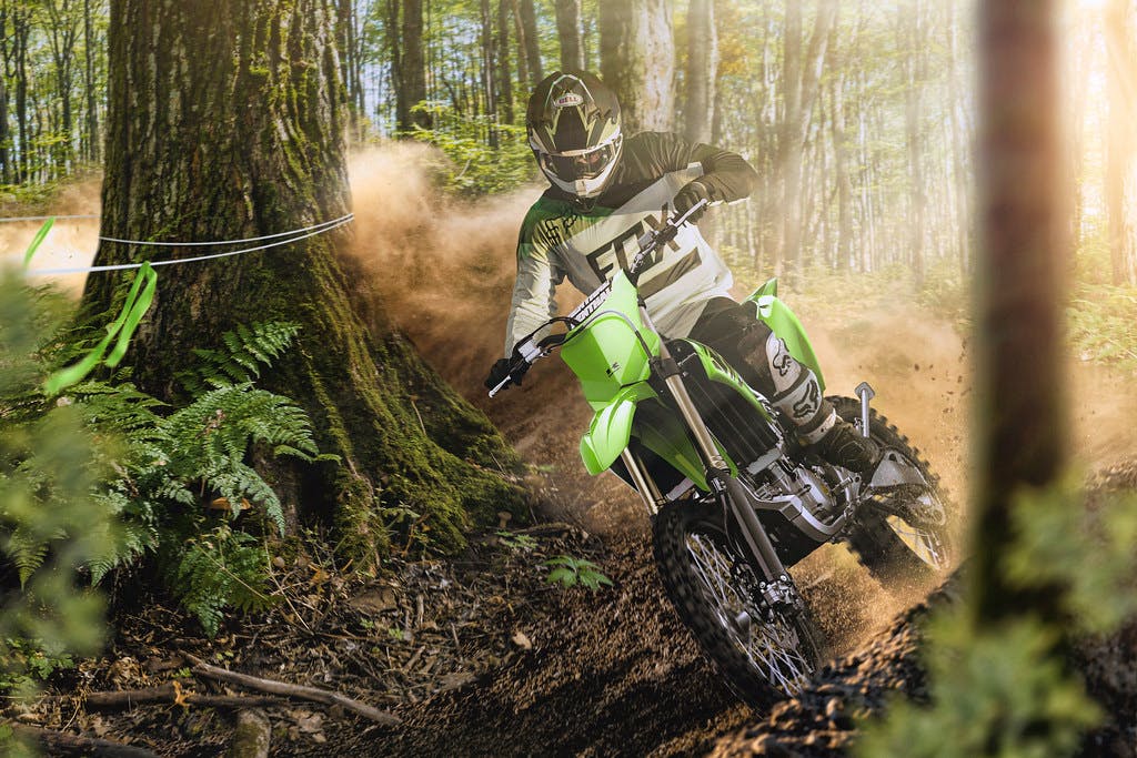 Kawasaki KX250X in Lime Green colour on off-road track