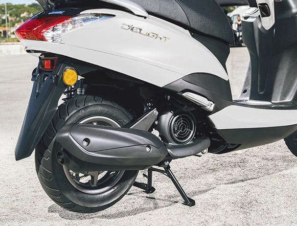 Yamaha D'elight 125 scooter on centre stand with exhaust