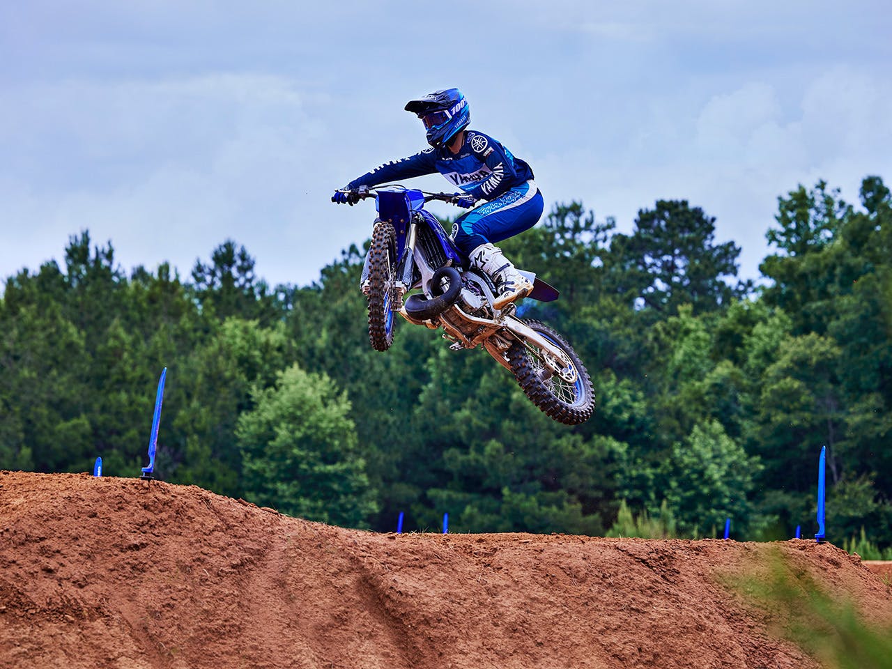 Yamaha YZ250 in team yamaha blue colour, being ridden off-track