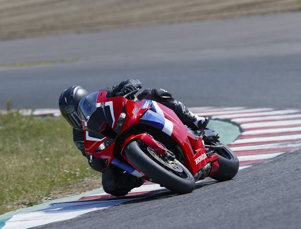 Honda CBR600RR in Grand Prix Red colour on race track