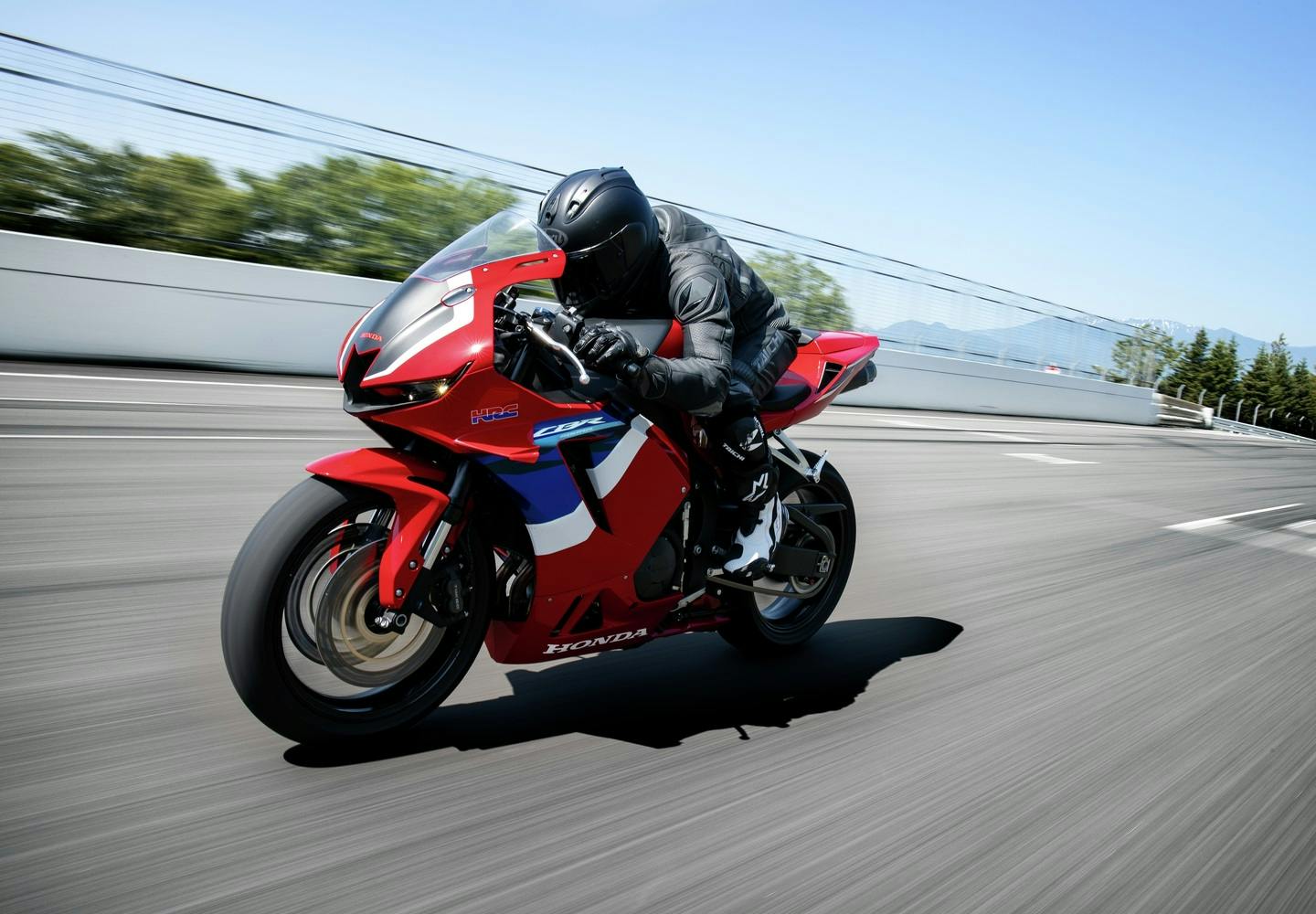 Honda CBR600RR in Grand Prix Red colour on the road