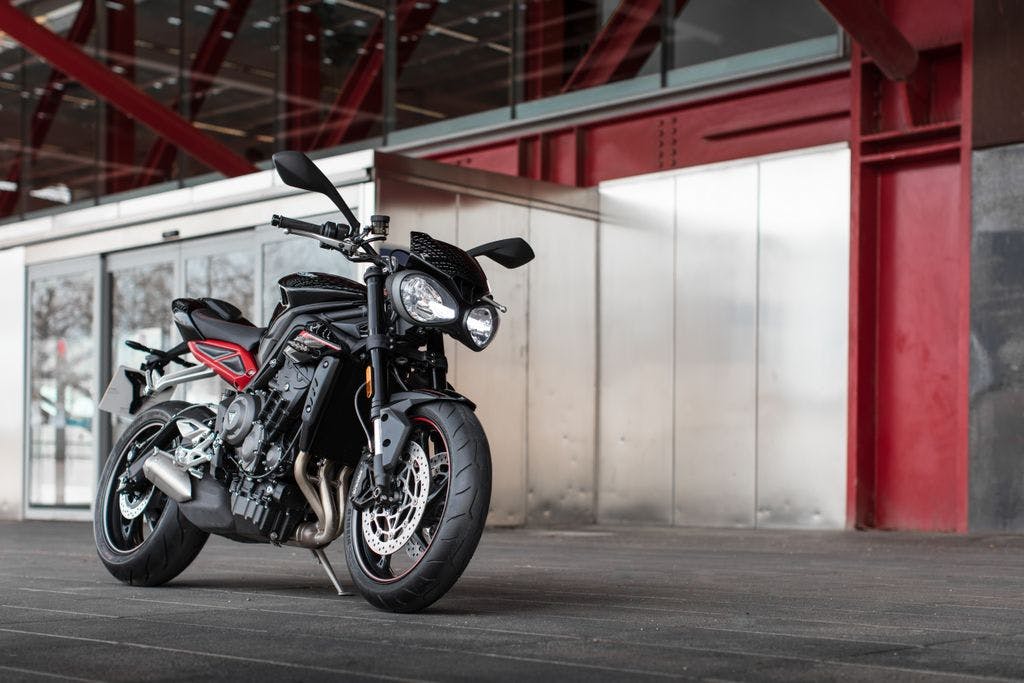 Triumph Street Triple R in jet black colour, parked