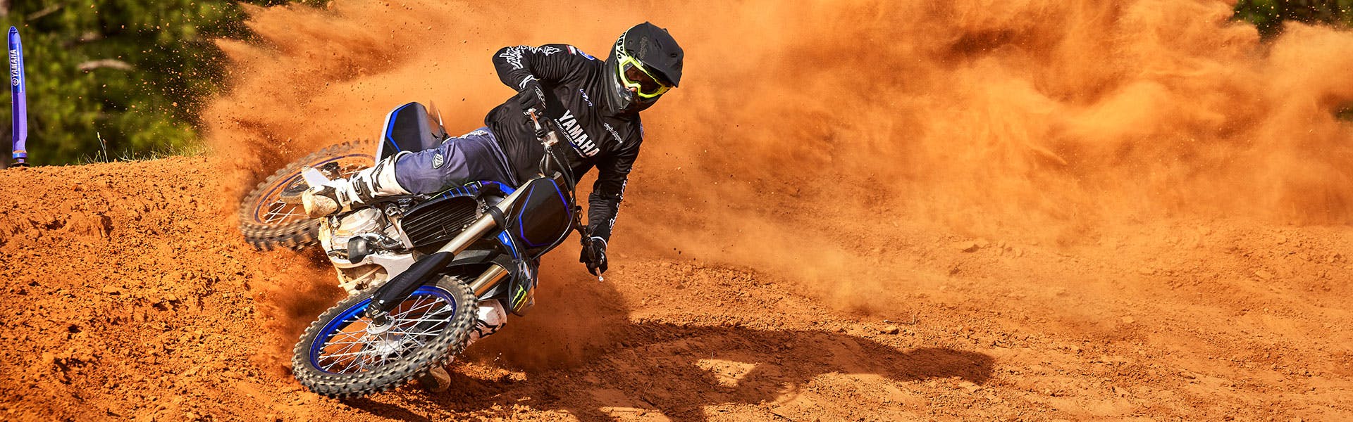 Yamaha YZ450FSP on Monster Energy Yamaha Racing Edition in action off road.